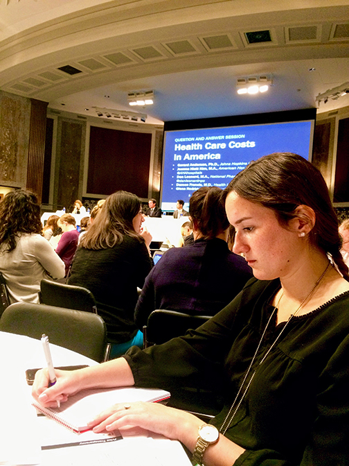 Kelsey Cramer at a briefing